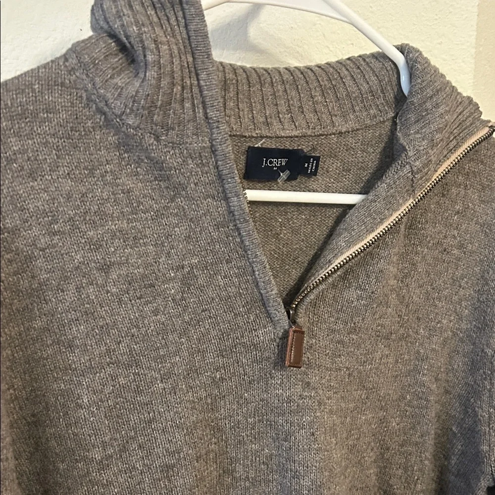 JCrew 100% Lambswool Sweater with a 1/4 zip at the neck.